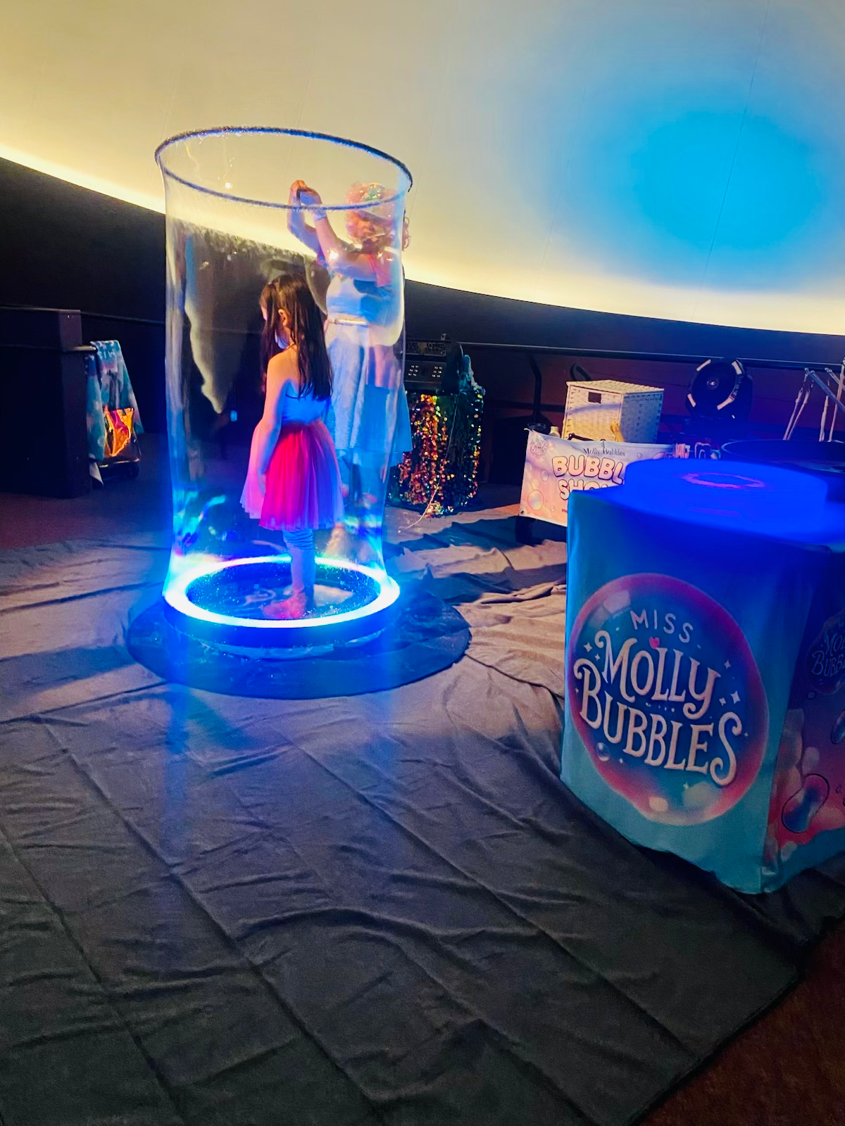 Miss Molly performing Kid in a Bubble at Chabot Space and Science Center