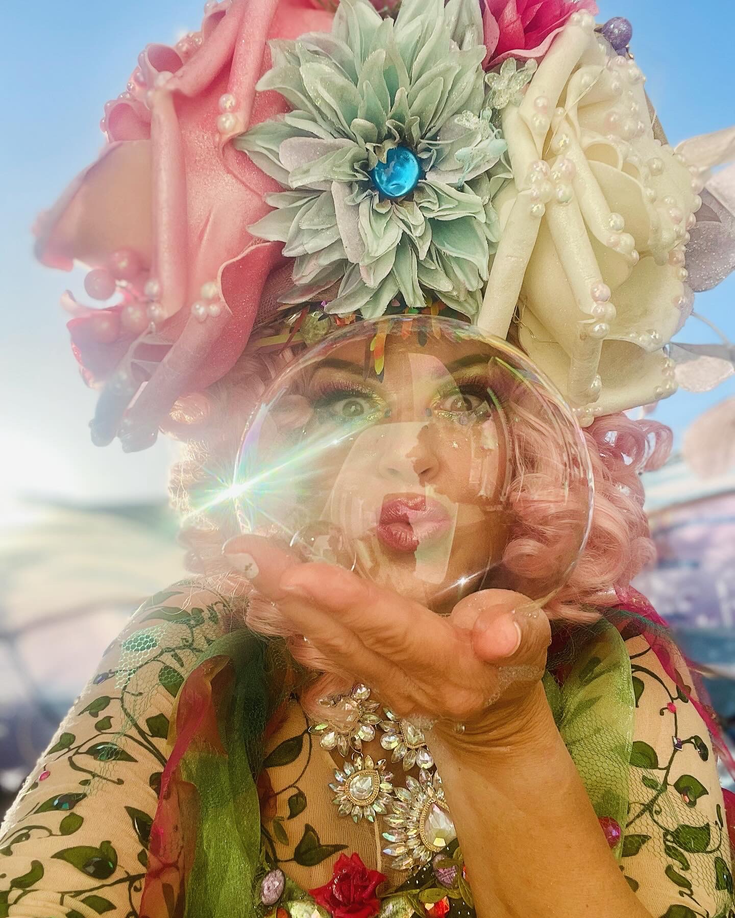 Miss Molly as the Bubble Fairy kissing a bubble
